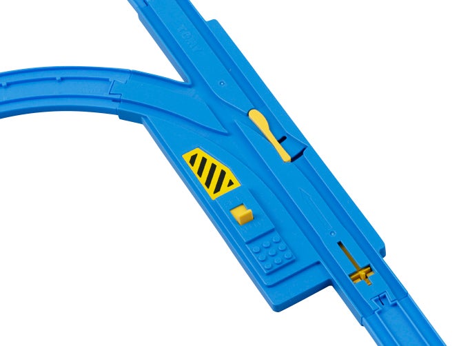 自動ターンアウトレールはAUTOにすると、車両が通るたびにポイントの方向が自動で切り替わり、SETにすると、好きな方向で固定させる事ができるよ。